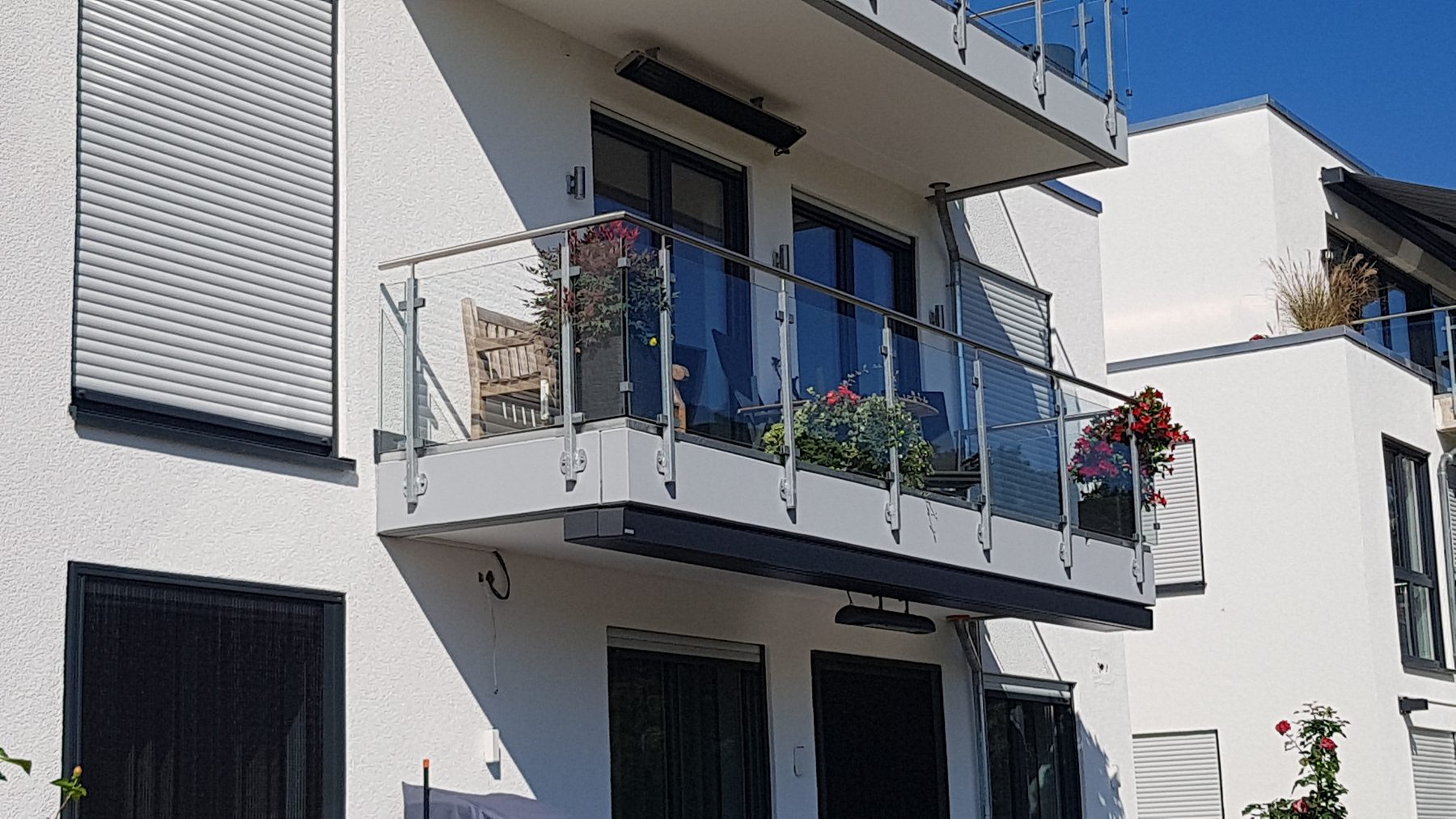 Balkon mit Glasgeländer – Metallbau Stienen GmbH